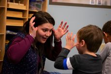 Kaitlyn Gyorko works with children at the WVU Nursery School